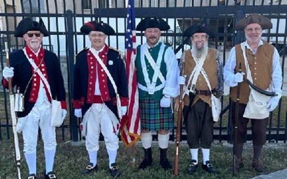 A group of men in clothing

Description automatically generated